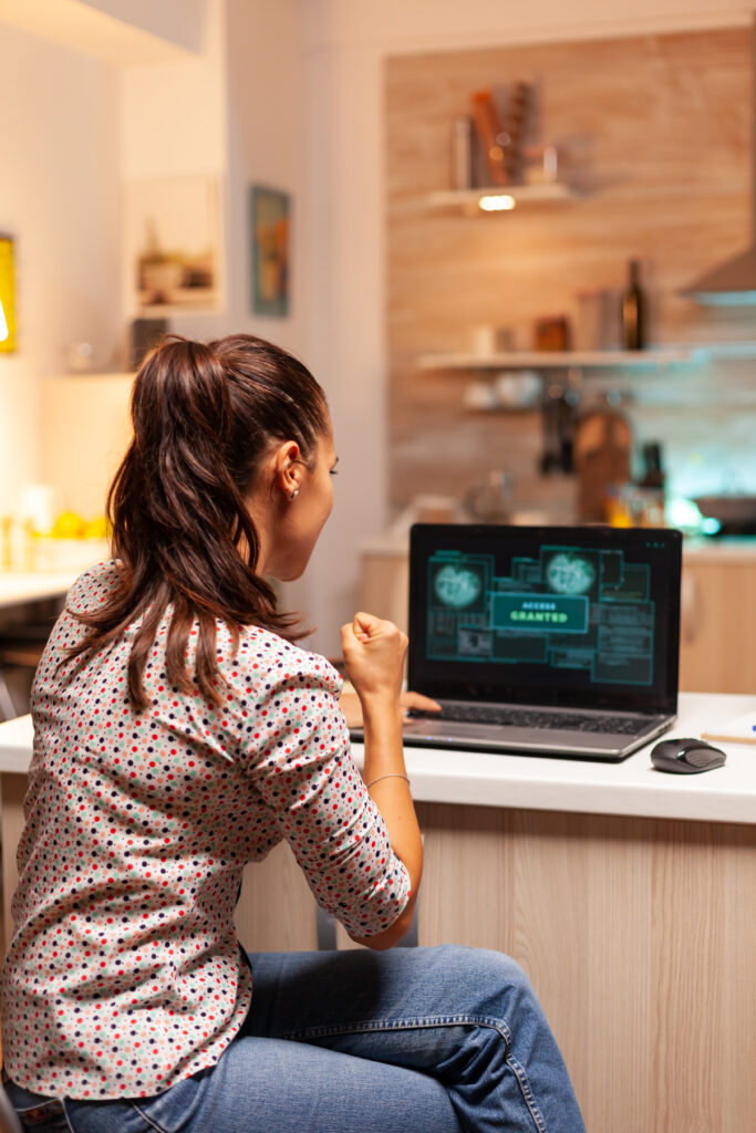 happy woman hacker after cracking firewall government getting access granted programmer writing dangerous malware cyber attacks using performance laptop midnight
