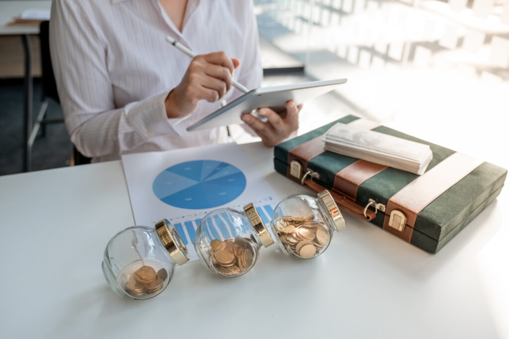 midsection woman using digital tablet office