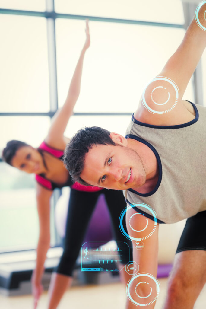 two sporty people stretching hands yoga class against fitness interface